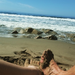 Relaxing on a Santa Barbara Beach after a morning run.